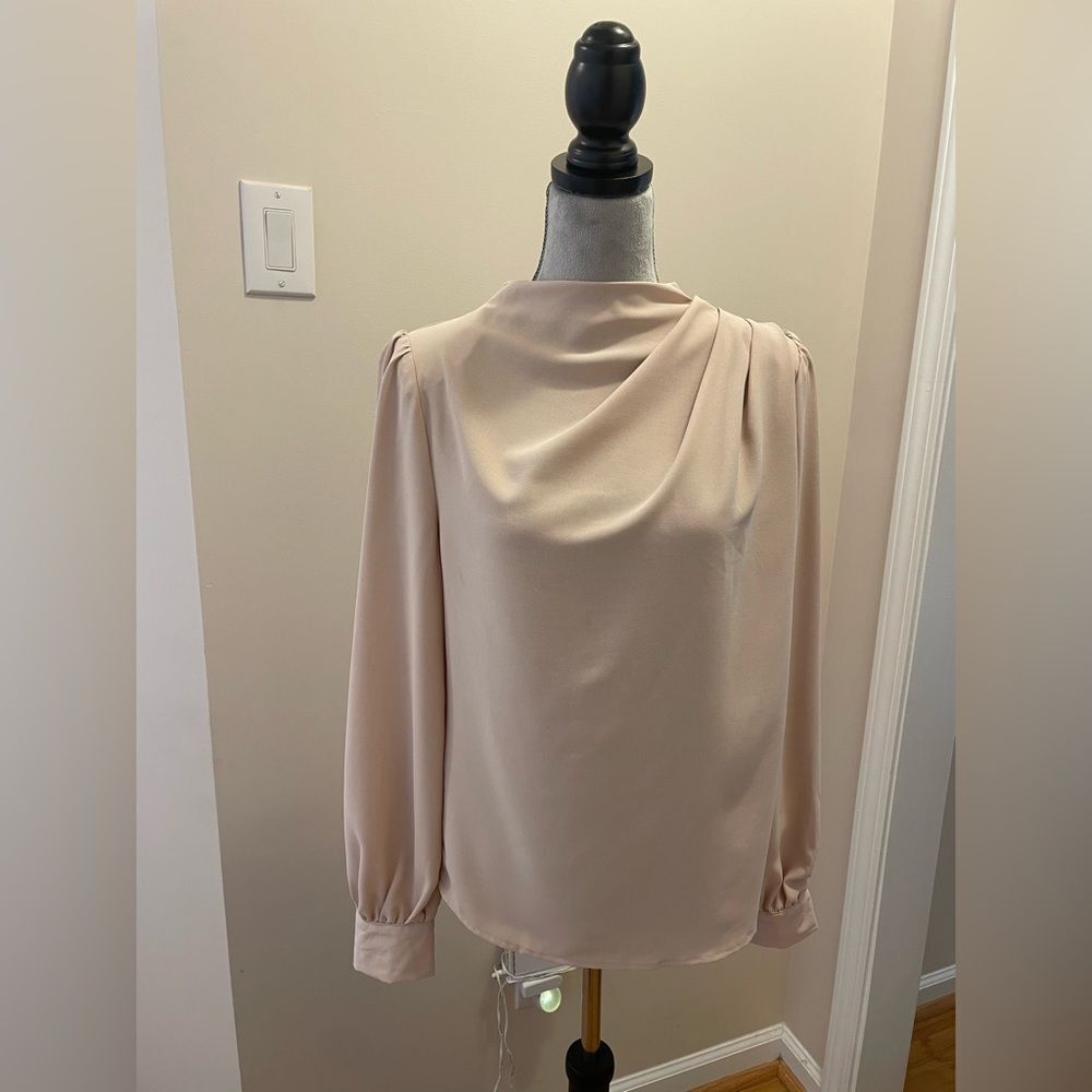 Elegant beige blouse with pearl like accent